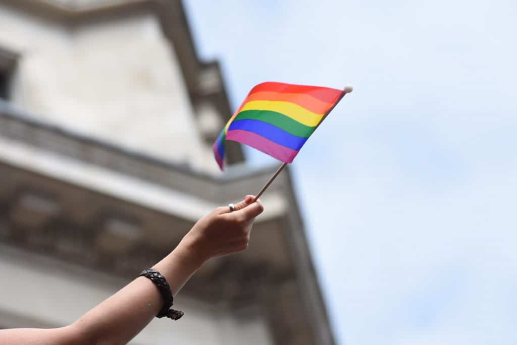 LGBT flag waving