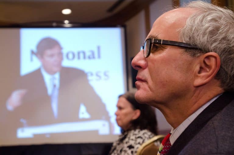 Marshall Matz listens to Agriculture Secretary Tom Vilsack
