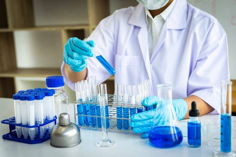 Biotech scientist testing chemicals